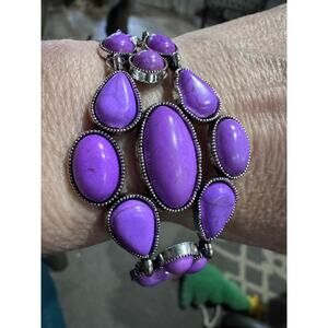 purple and silvertone bracelet